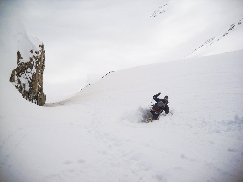 Descending the "Exit Couloir" in sloppy spring conditions. A line out on the face to the right is passable in all but the most meager snow years as well.