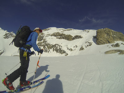 Below the East Face of Buck. The ascent goes up a small couloir just left of the prominent buttress on the right side of the picture, then traverses across and up the East face. Or ascend the East Ridge for a little more spice (4th class)