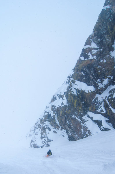 Storm skiing in the lower portion of the couloir