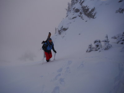 Hiking to get some socked in sunrise turns. Can be a little too steep to switch back in some conditions, but usually you can lay a track down.