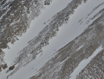 Looking over at ski tracks and a group climbing the Tuning Forks.