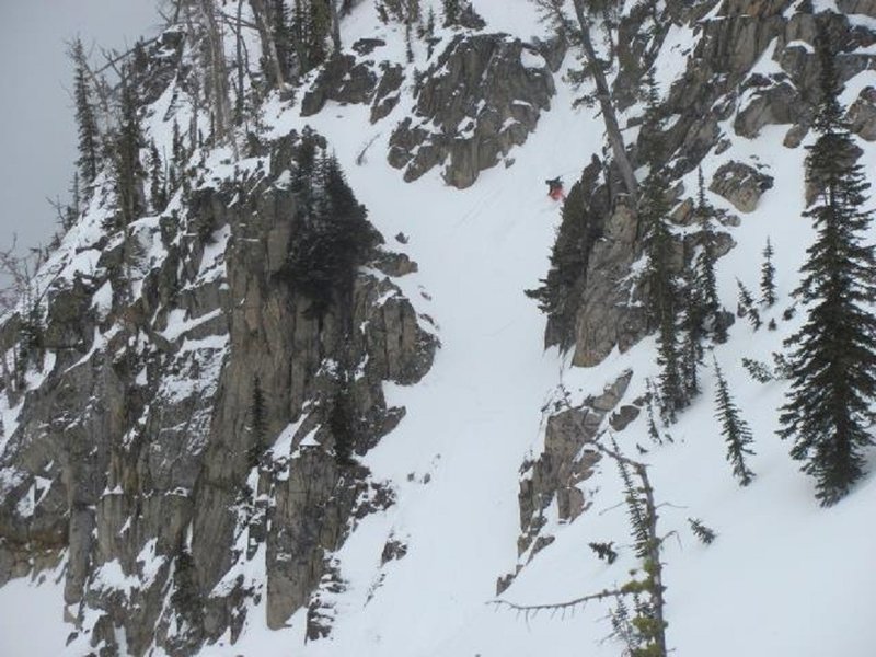 Skiing the "Beast Chute" in Lick Creek Range, just below the crux.  Note the "shark fins" in the exit.