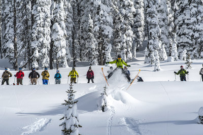 Cat 3 team watches me catch some air on Elephantitus.