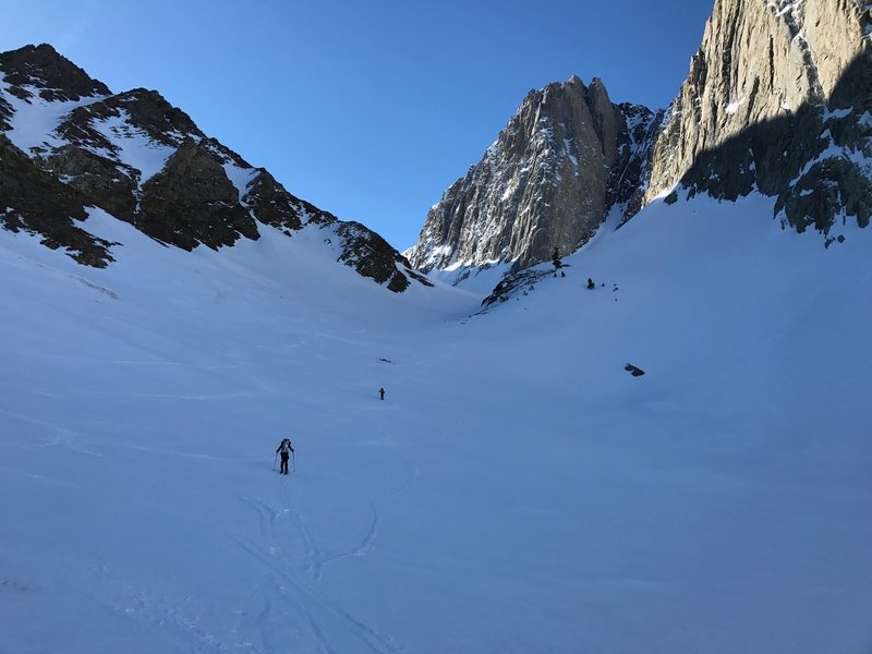 Ascending the chute at 9 am. Had to use crampons because snow was packed hard.