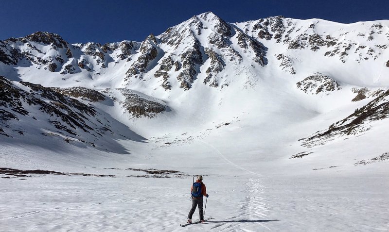 Approaching Sayers to ski X-Rated Couloir (Center), the approach climbs up the large chute on the right.