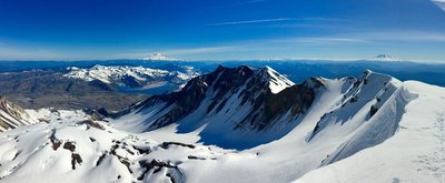 A view of the caldera and lava dome with Rainier and Adams in the background.