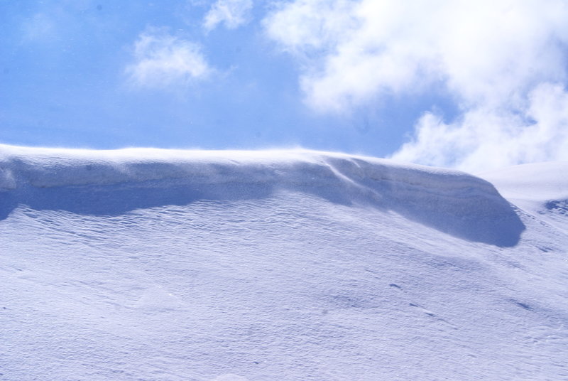 A cornice forms along a ridge of Mount Ara.