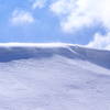 A cornice forms along a ridge of Mount Ara.