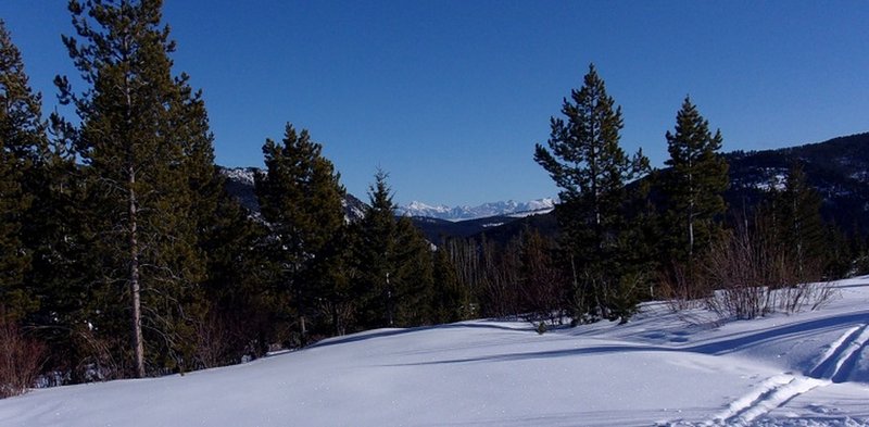 View SE to Absaroka Range (Black Mountain on left, Mt Cowan on right) from big switchback at 2.05 miles