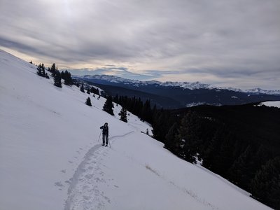 Skinning back up and working to the north and east looking for deeper snow.