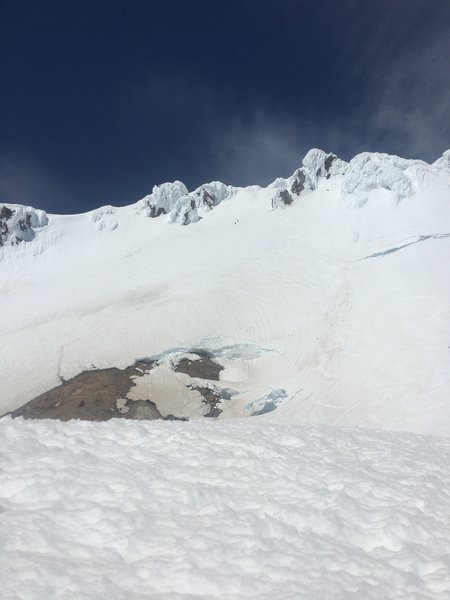 Looking up to the Old Chute route from the base of the Hogsback.  Left side of the photo is part of the West Crater Rim. Right side shows the bergschrund, lower left shows the Hot Rocks/fumaroles