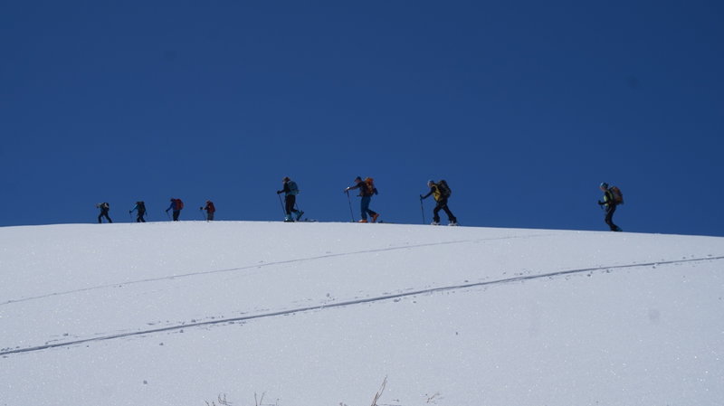 Skiers on the peak of Tsaghkunyats sierra