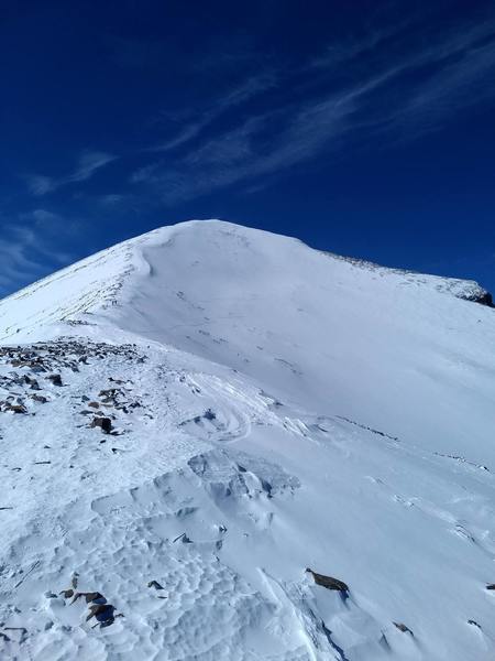 A view of the Upper East Bowl. Taken standing on the saddle, looking west towards the final summit ridge.