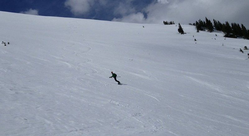 Carl Pluim skiing the far lookers right side of the Roberts Creek NE Headwall from the approach trail April 21st 2019, Berthoud Pass