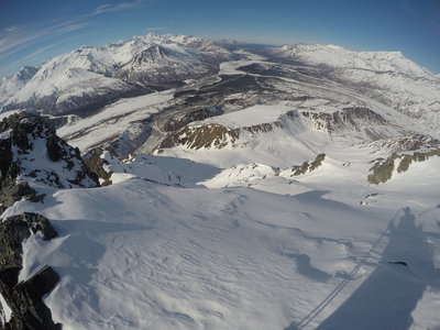 Looking down from the summit. The highway, Red Rock Canyon Rd. and the top of the gut are visible to the left and the small lake can be seen on the right.