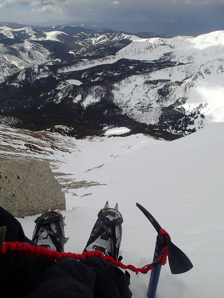 Looking down from the top of the Grand Couloir. Monarch Ski Area is visible in the background.