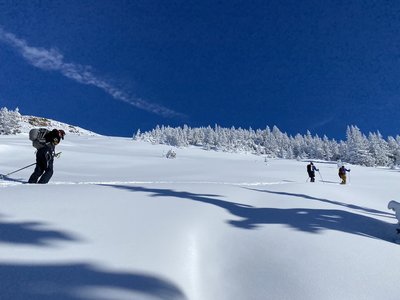 Ascending the meadows below Lobster Claw.