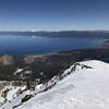 View from Tallac summit facing South Lake Tahoe. Photo taken during early Spring conditions (end of March, 2021).
