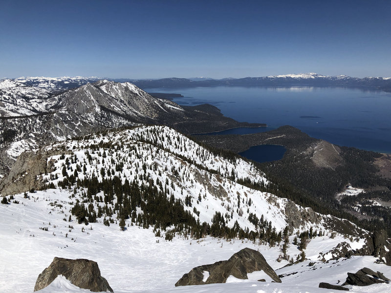 View from Tallac Summit toward Emerald Bay and Cascade Lake. Photo taken during early Spring conditions (end of March, 2021).