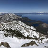 View from Tallac Summit toward Emerald Bay and Cascade Lake. Photo taken during early Spring conditions (end of March, 2021).