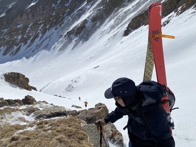 Ben looking back down at Alexis and Michael, booting their way just up past the choke.