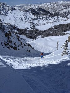 Skinning up Stupid Chute. Looking North with Highway to Heaven in the background left.