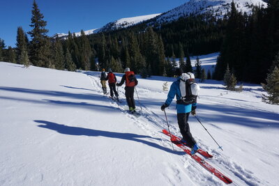 100 Turns of Fun is the face in the upper middle of the photo, Uneva Peak behind it. South Uneva Bowl is off-camera to the right.
