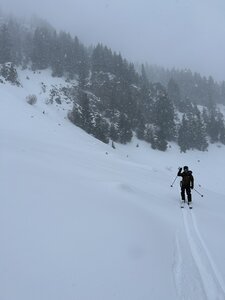 Skiing down the large bowl.