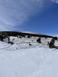 On ascent, NW side of Niwot Peak facing south, looking at Niwot Peak. Snow transported off of ridge shoulder. Many wind burms and bare spots.