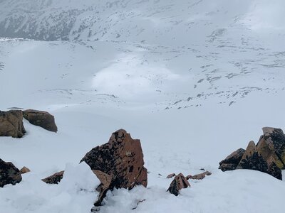 looking down from the true summit - take care with the first few turns up here, or hike back down to the saddle to start your descent