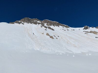 looking back at the rock spire, cosmic couloir is at center but set back behind view