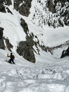 04/12/2025 Dropping into Hallet's North couloir from the middle entrance. This is in-between the steepest entrance (looker's right [LR] entrance), and the mellowist (LL entrance). Cornice present on LL entrance. Very warm spring day ~70F @ 11:58am