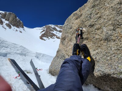Relaxing at the big boulder in the back of the drainage before the steep climb. I did NOT ascend the couloir in the picture due to the cornice. I opted for a couloir to the left