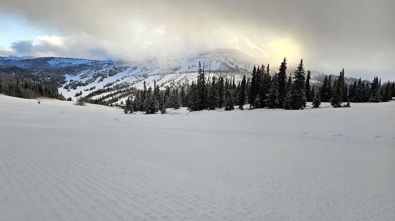 Sunrise over Brian Head Peak across the valley.