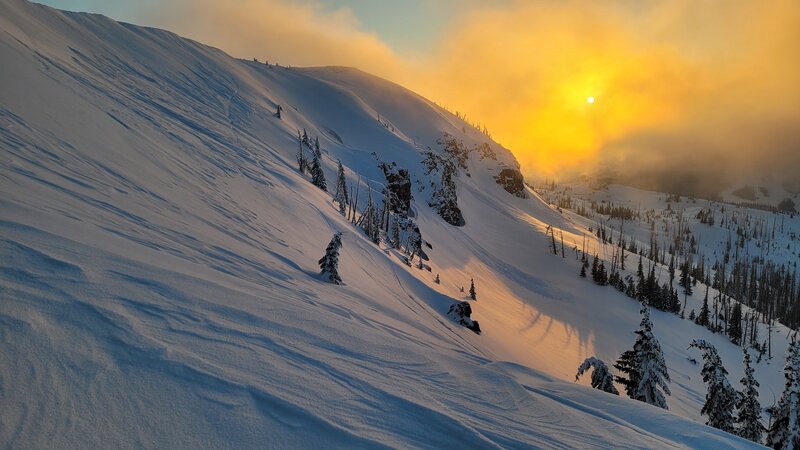 Sunset over Brian Head. Closest area is Brent's Big Bowl, with the Tabs right behind (middle-ish of photo).