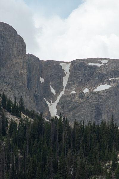 A view of the line's first descent (?) from the trail across Lake Geneva